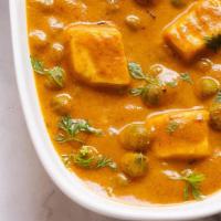 Muttar Paneer · Homemade cheese and garden peas cooked in onion, tomato and creamy curry sause
