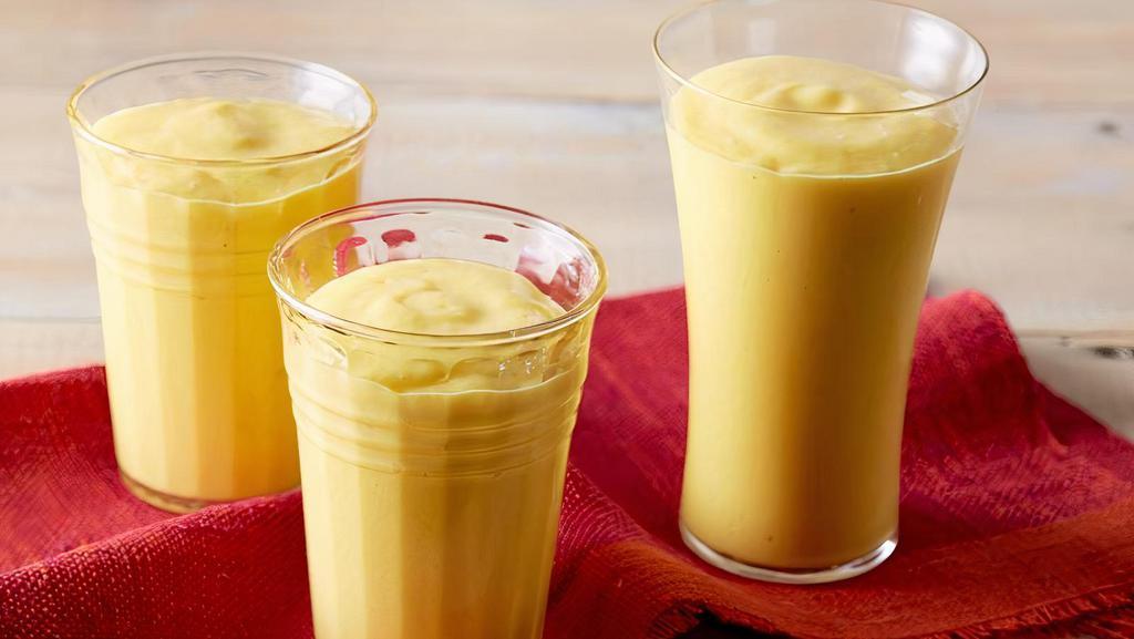 Mango Lassi · Refreshing whipped mango and yogurt drink.