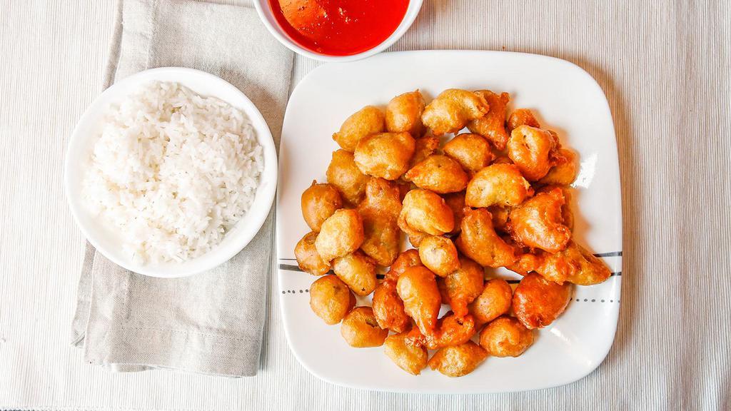 Sweet & Sour Pork · Deep-fried cubic pork in light batter and topped with sweet and sour sauce.