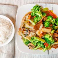 Broccoli With Beef · Sliced meat stir fried with broccoli, mushrooms, chopped onions, bamboo shoots and water-che...
