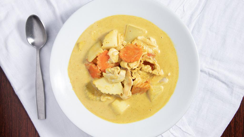 Yellow Curry · Spicy. Yellow curry, coconut milk, potatoes, and carrots.