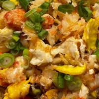 Crab Fried Rice · Fried rice with egg, tomatoes, onions and crab meat.