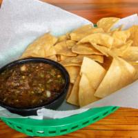 Chips & Salsa · housemade corn tortilla chips with salsa fresca (medium-spicy). serves 2-3 with basket of ch...