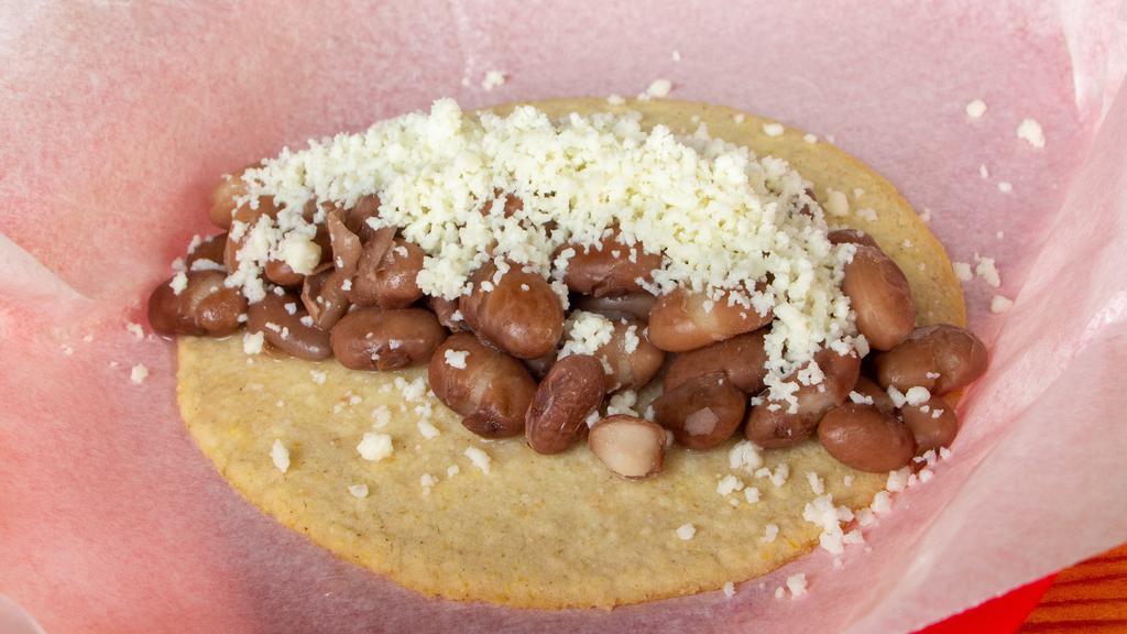 B&C Taco · pinto beans topped with your choice of queso fresco or queso Oaxaca in a housemade organic corn tortilla

**gluten-free**