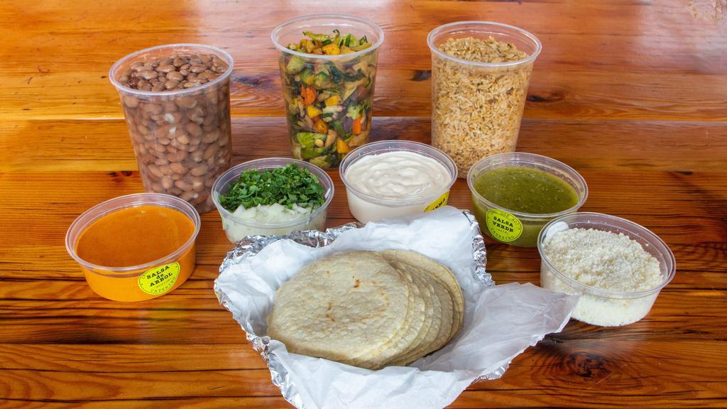 Pqn Taco Kit · Fully cooked*, packed cold, reheat in the comfort of your own home. Tacos and sides for 4-6 people! 

Choose one: barbacoa, carnitas, pollo verde or veggie: hongos y papas*
*To keep them fresh, hongos y papas are a mix of raw & par-cooked veggies. They are packed as a 1. 5 quarts and will need a quick saute and a pinch of salt. 

Each kit contains: 
1 quart of meat or veggies
1 quart each of beans and rice
15 handmade corn tortillas
Includes toppings (all on the side): cilantro & onion, salsa verde, salsa de arbol, crema**, queso fresco. 
**hongos y papas comes with garlic-habanero crema

-No substitutions, thank you for understanding!

**gluten-free**