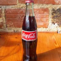 Mexican Coke · made & bottled in Mexico with cane sugar
