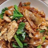 Pad Si Iew · NEW DISH!! Stir-fried wide noodles with sweet soy sauce, eggs, and Chinese broccoli. Chicken...