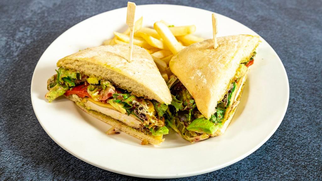Chicken Ciabatta Sandwich · Basil pesto, gouda cheese, roasted red peppers, mixed green lettuce & avocado. (Grilled or blackened)