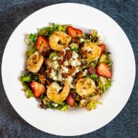 Walnut Salad · Mixed greens, bacon bites, strawberries, walnuts, blue cheese, cranberries, pistachio and vi...