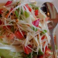 Som Tum · Hot and spicy. Fresh green papaya salad, with dried shrimp, a traditional Northeastern Thai ...