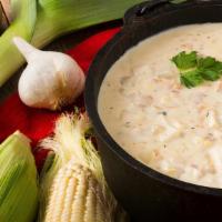 Market Chowder · Chef's Choice of fresh ingredients. May include a variety of seafood.
