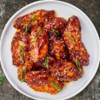 Korean Bbq Wings · Fresh chicken wings breaded, fried until golden brown, and tossed in Korean BBQ sauce. Serve...