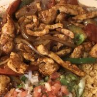 Chicken Fajitas · Served with rice beans guacamole and pico de gallo.