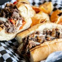 The Works · Steak, cheese, onions, mushrooms, and peppers.