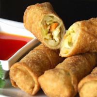 Egg Rolls · Handmade egg rolls. Served with a Sweet Chili Sauce.