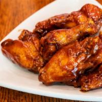 Chicken Wings · Made fresh in our kitchen with our special seasonings. Your choice of BBQ, spicy BBQ, buffal...