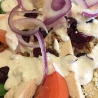 Two Girls House Salad · Our crisp mix of fresh salad greens served with tomatoes, black olives, sliced red onions an...