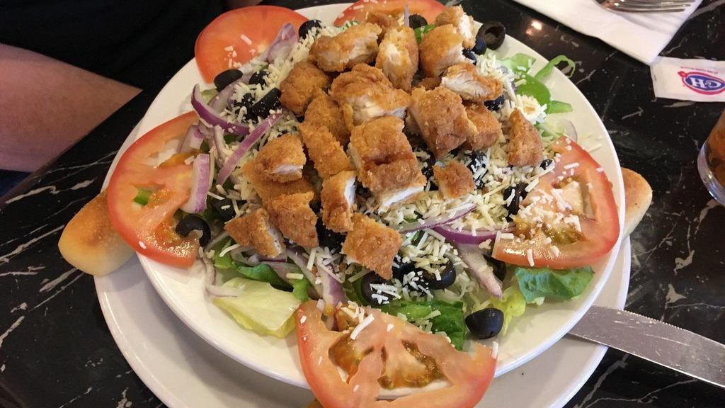 Greek Salad · Mixed greens, feta cheese, Kalamata olives, pepperoncini, red onion, cucumber and garbanzo beans. Choice of chicken or salami. Served with red wine vinaigrette.