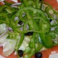 Vegetarian Antipasto Salad · Artichoke hearts, fresh sliced mushrooms, sun-dried tomatoes, black olives, green peppers, r...