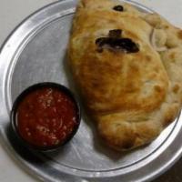 Calzone · The classic half-moon filled with ricotta cheese, our special blend of mozzarella cheeses, r...