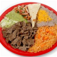 Carne Asada Plate · Angus Steak Meat
W/ Lettuce, Guacamole & Mexican Salsa
2 Flour Or 3 Corn Tortillas