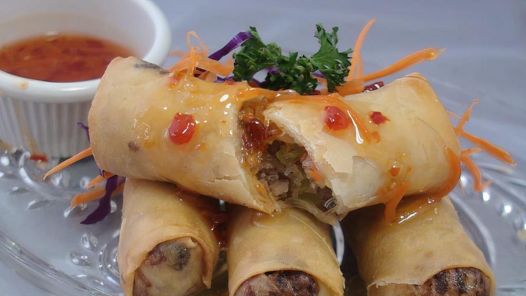 Chinese-Thai Egg Rolls (Po Pia Tod Jeen)  · These are Red Basil’s traditional egg rolls, kept per customer-request. Deep-fried egg rolls stuffed with glass noodles and shredded vegetables. Served with our House Sweet Thai Chili Sauce. Full portion comes with 5 egg rolls.
