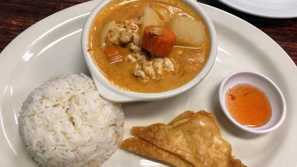 Massaman Curry · Made with coconut milk, roasted peanuts, potatoes, onions, carrots, and intense Thai spices.  Served with Jasmine rice