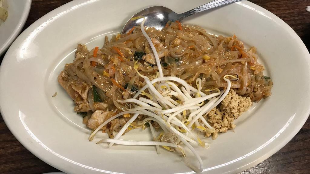Pad Thai · The most famous Thai dish in the USA and Red Basil’s Pad Thai is the best in Utah. Stir-fried exclusive rice noodles with egg, our famous Special Pad Thai Sauce, crushed house roasted peanuts, green onions, bean sprouts, and carrots.