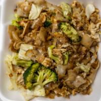 Pad Si Eiw · Stir-fried fresh flat/wide rice noodles with egg, broccoli, cabbage, garlic, a sweet soy sau...