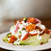 Wedge Salad · Iceburg Lettuce, Pickled Red Onion, Applewood Smoked Bacon, Tomato, Diced English Cucumber, ...