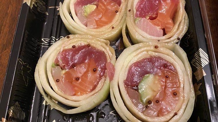 Mt. Fuji Naruto Roll · Tuna, salmon, yellowtail, avocado & caviar wrapped with cucumber