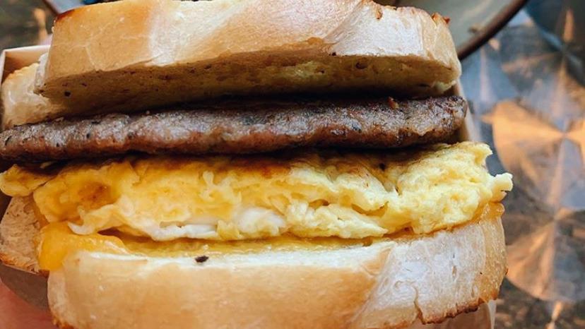 Breakfast Sandwich · Your choice of white, wheat or sourdough bread. Choice of bacon, sausage or ham with cheddar cheese and two scrambled eggs.