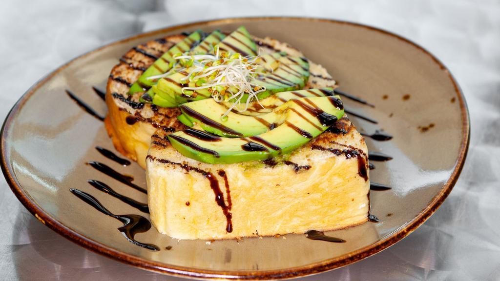 Avocado Toast · Texas Toast, fresh sliced avocado, sprouts with a balsamic drizzle