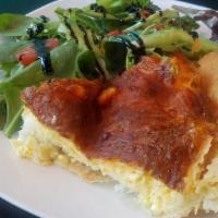 Quiche · Grandma's pie crust filled with a new surprise each day