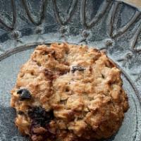 Brekkie Cookie · Gluten free, vegan cookie made with peanut butter, oats, coconut and blueberries
