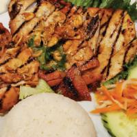 Grilled Chicken Rice Plate / Cơm Gà Nướng · Marinated grilled meats served with steamed rice, lettuce, sliced cucumber, shredded pickled...