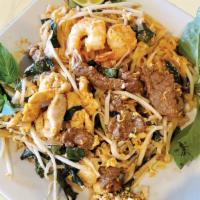 Combination Pad Thai / Phở Xào Thập Cẩm · With combination of beef, chicken and shrimp.