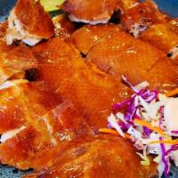 Hongkong Style Roast Duck （Whole）港式烧鸭整只 · 港式烧鸭-整
HONGKONG STYLE ROAST DUCK WITH BONE AND SERVING WITH DUCK SAUCE AND SWEET & SOUR SAUC...