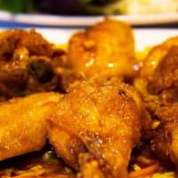 Savory Chicken Wings · Special. Fried chicken wings tossed in house-made fish sauce, served with lettuce, spicy or ...