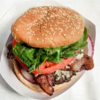 Bacon Blue (1/2 Pounder) · Half pound patty on a toasted bun topped with fresh cooked bacon,  red onion, mayo, tomato, ...