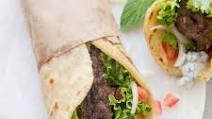 Gyro · Topped with tzatziki sauce, tomato, loose leaf, and red onion comes with a small portion of ...