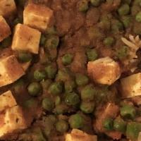 Mutter Paneer · Fresh green peas cooked with Indian cheese and spices.