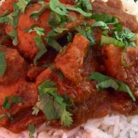 Lamb Curry · Tender pieces of lamb prepared in a mildly flavored ginger-garlic sauce.