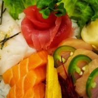 Chirashi · Gluten free. Nine pieces of sashimi over sushi rice.