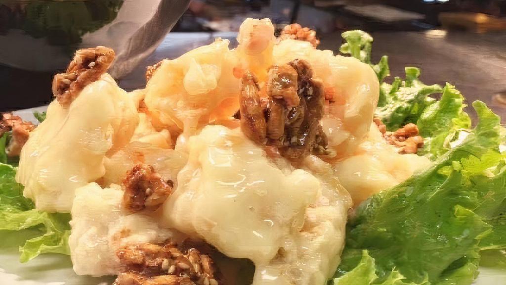 Honey Walnut Prawns · Succulent prawns in a honey cream sauce with candied walnuts. Served with steamed rice.