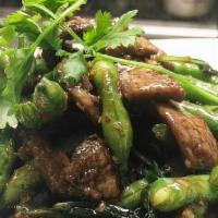 Basil Green Bean Stir Fry* · Beef, green beans, Thai basil, and cilantro. Served with steamed rice.