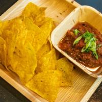 Chips & Salsa · Gluten free, vegetarian. Fire roasted house salsa with house made corn chips.