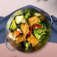 Kung Pao Vegetable Tofu · Stir-fried with roasted peanuts, vegetables, fried tofu, and Szechuan chili peppers in house...