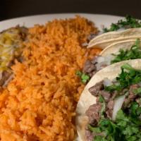 Azada Taco Plate · 3 steak street tacos served with side beans, and rice