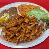 Adobada Taco Plate · 3 street tacos with house seasoned pork, served with beans and rice.